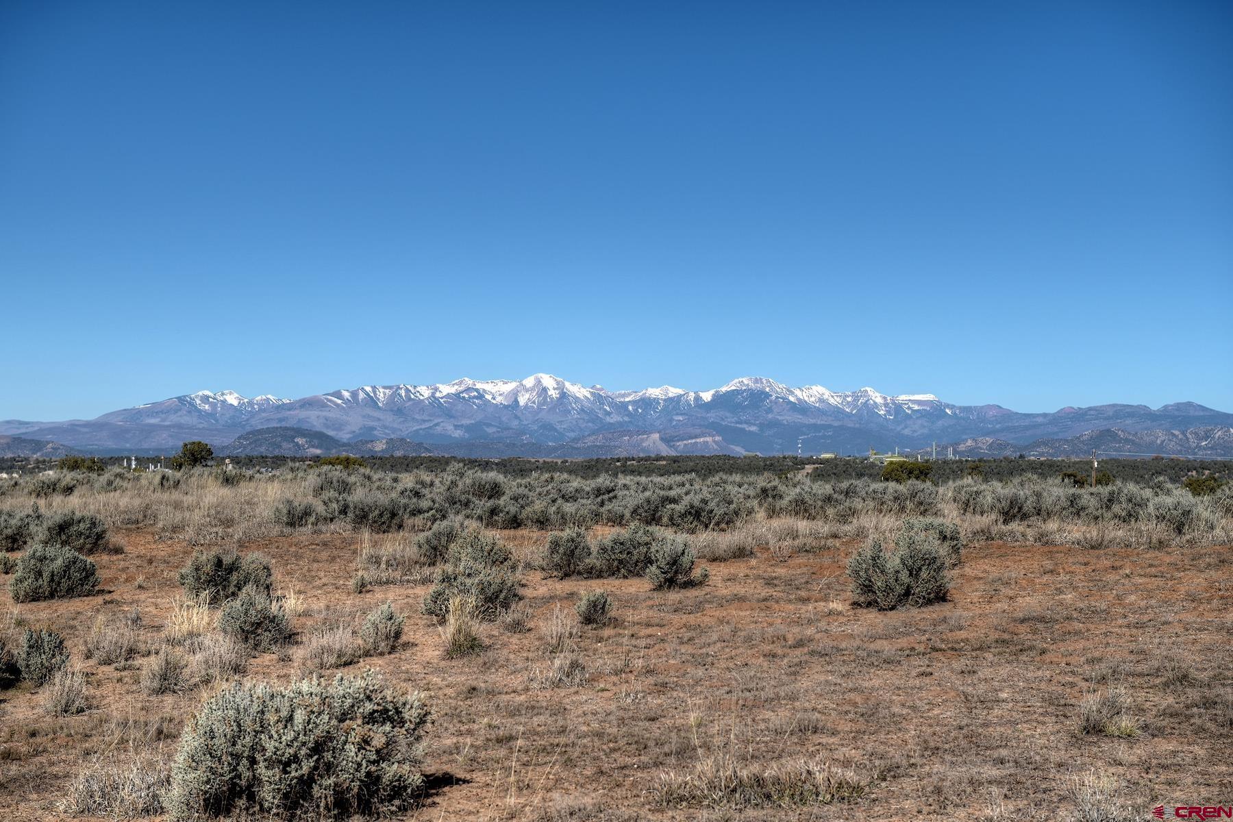 a view of a lake with mountains in the background