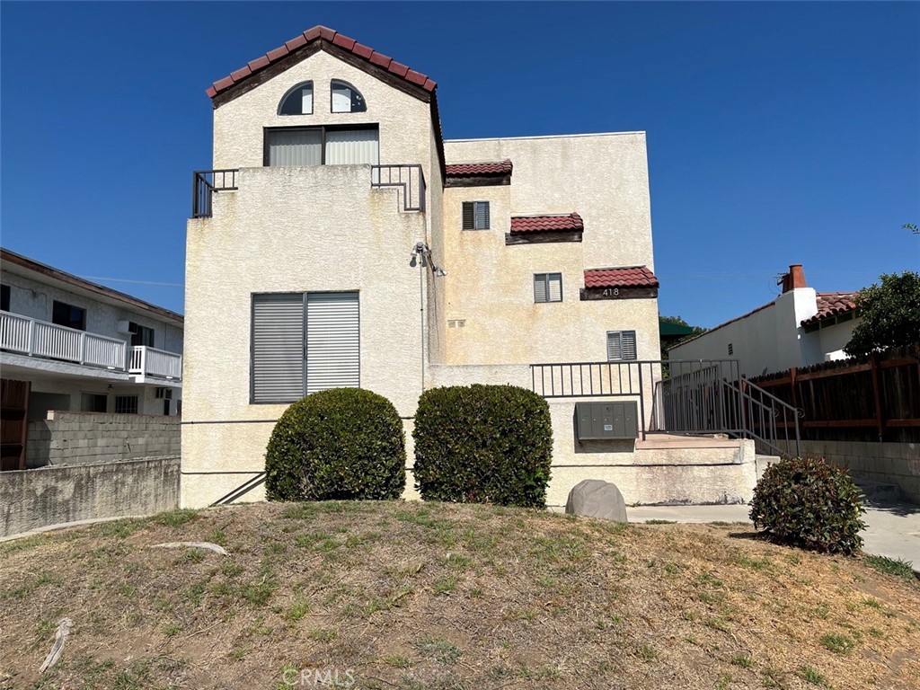 a front view of a house with parking