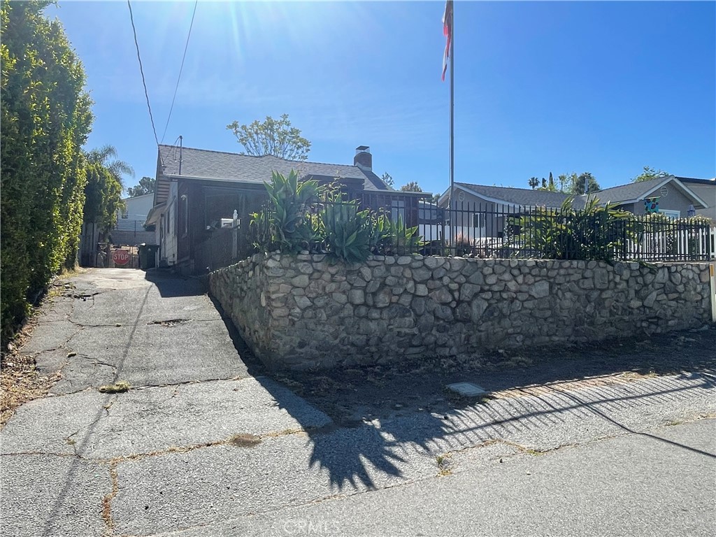 a view of a house with a pathway