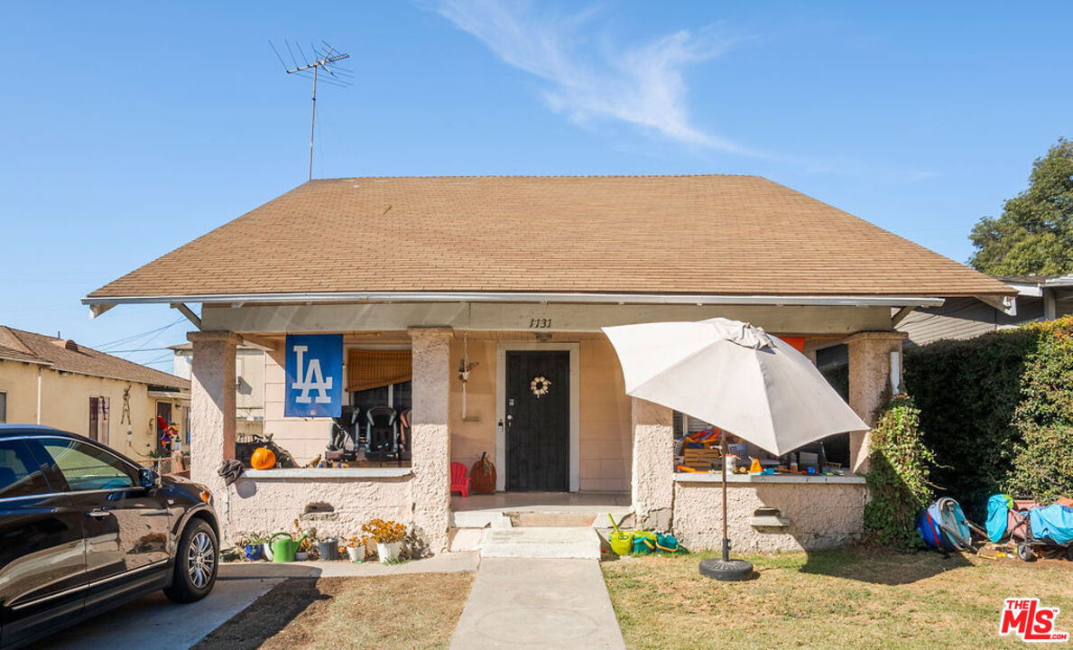 a front view of a house with a porch