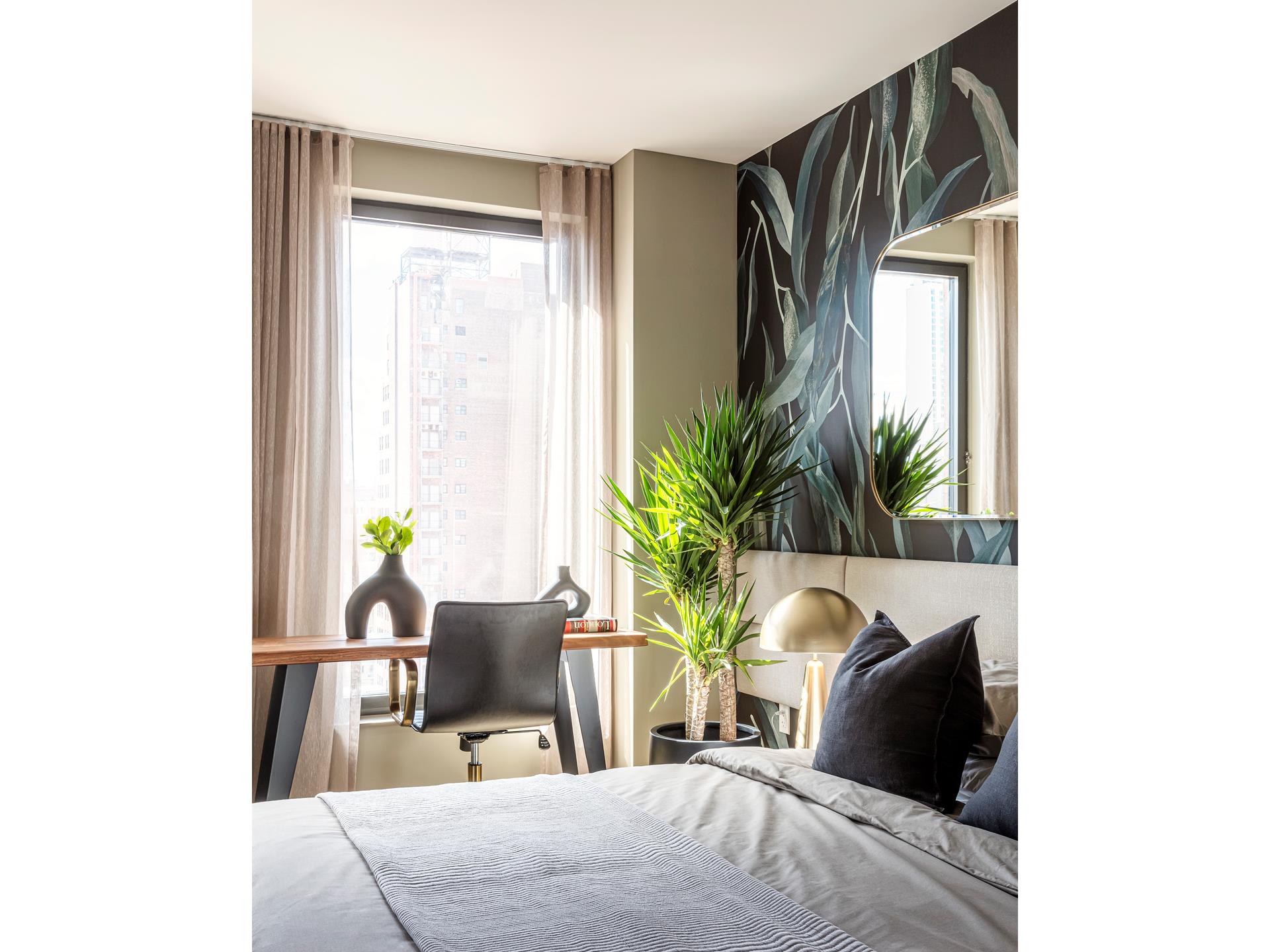 a potted plant sitting on a dresser next to a window