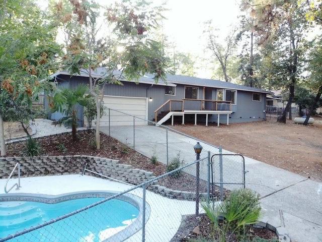 a house view with a outdoor space