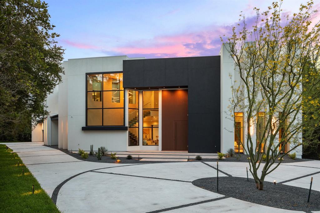 a front view of a house with a garage