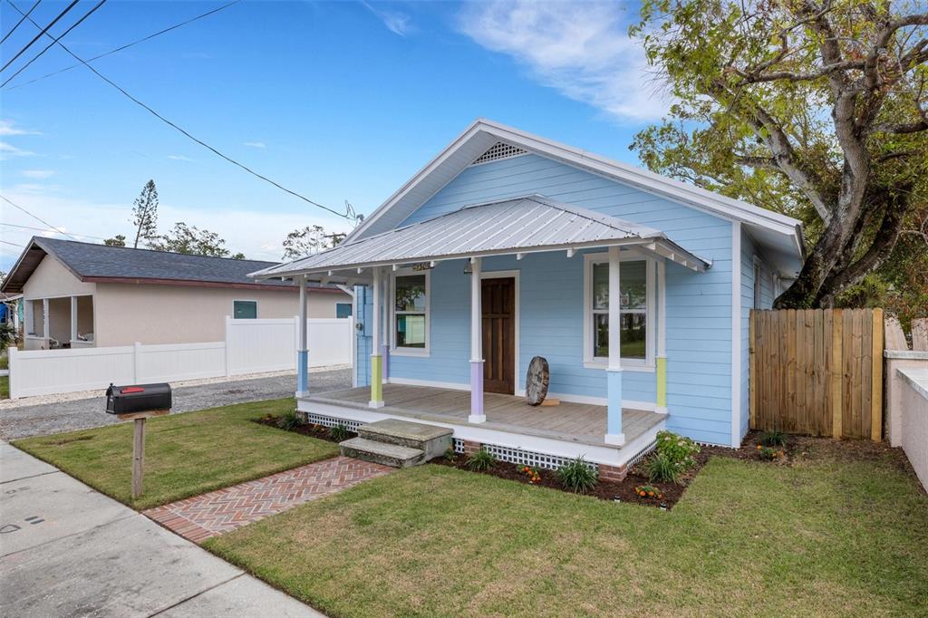 front view of a house with a yard