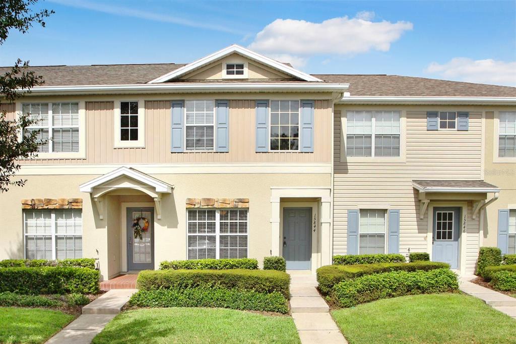 front view of a house with a yard