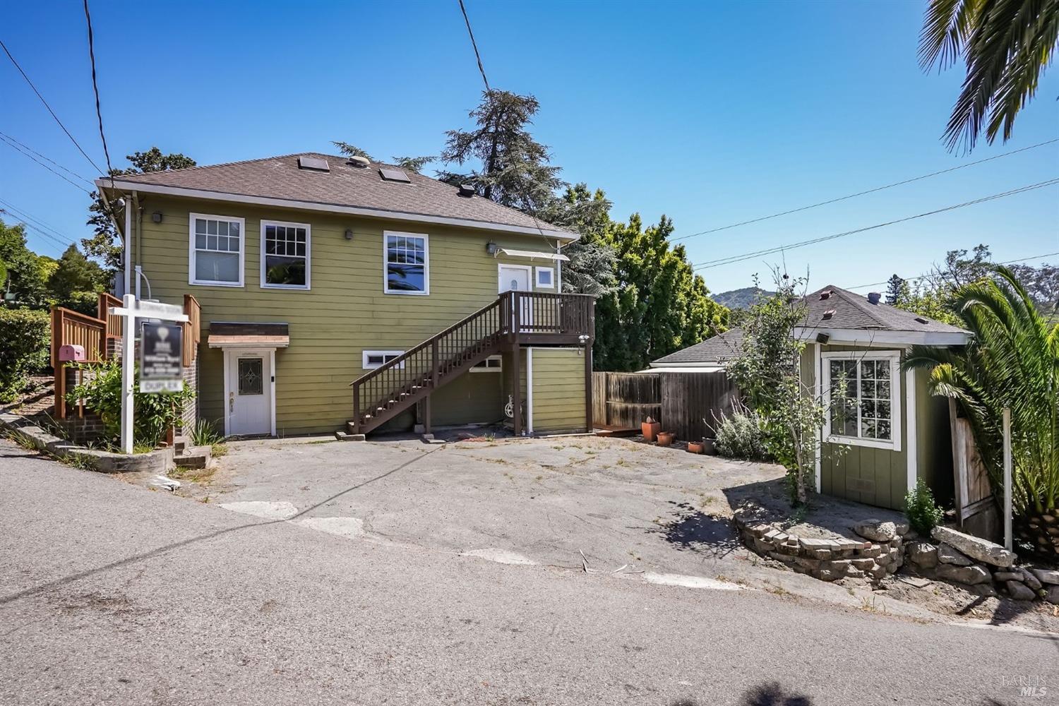 a view of a house with a patio