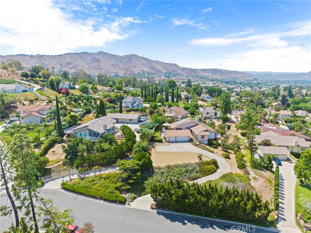 an aerial view of residential house with outdoor space