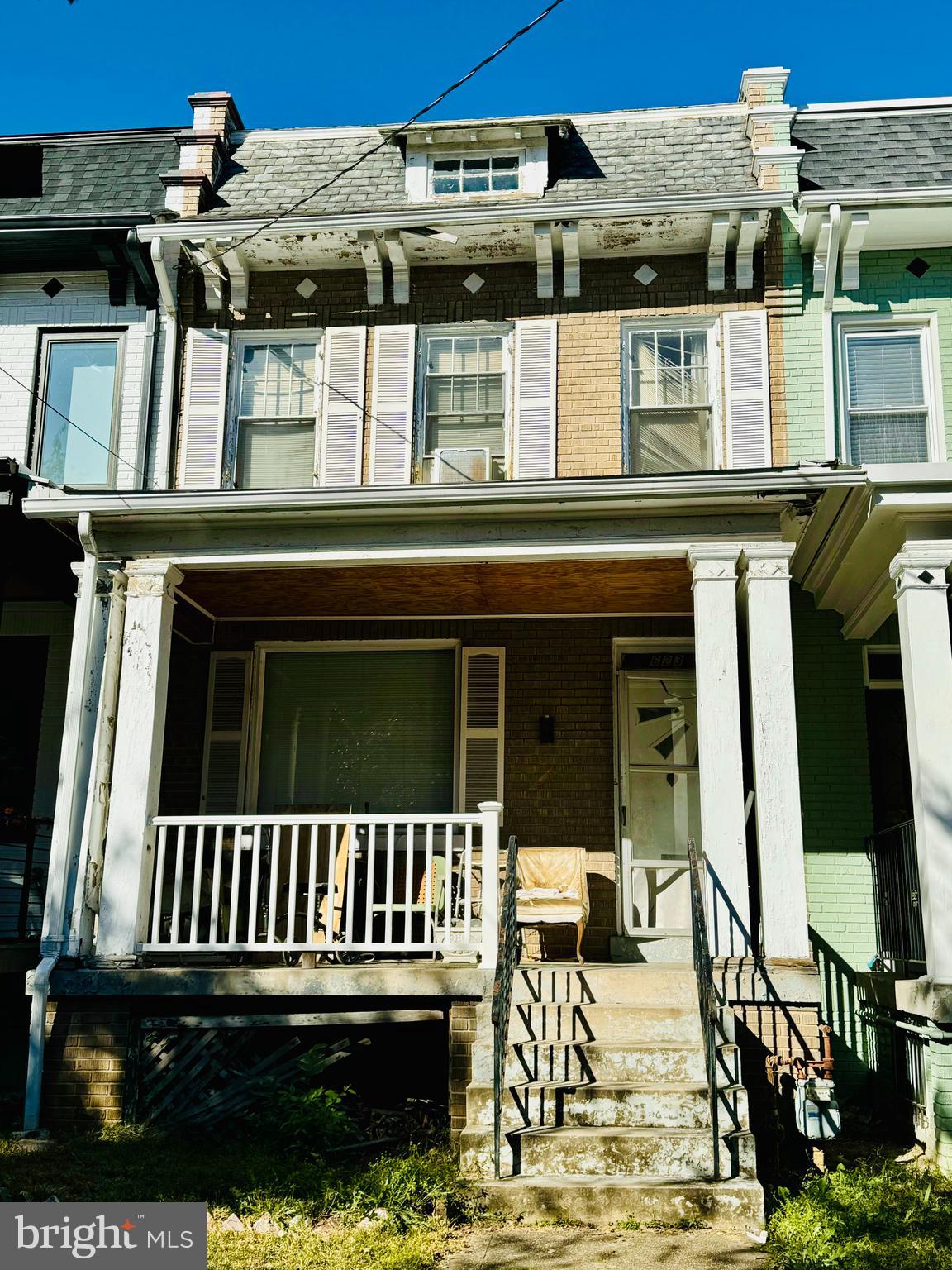 a view of a house with a deck