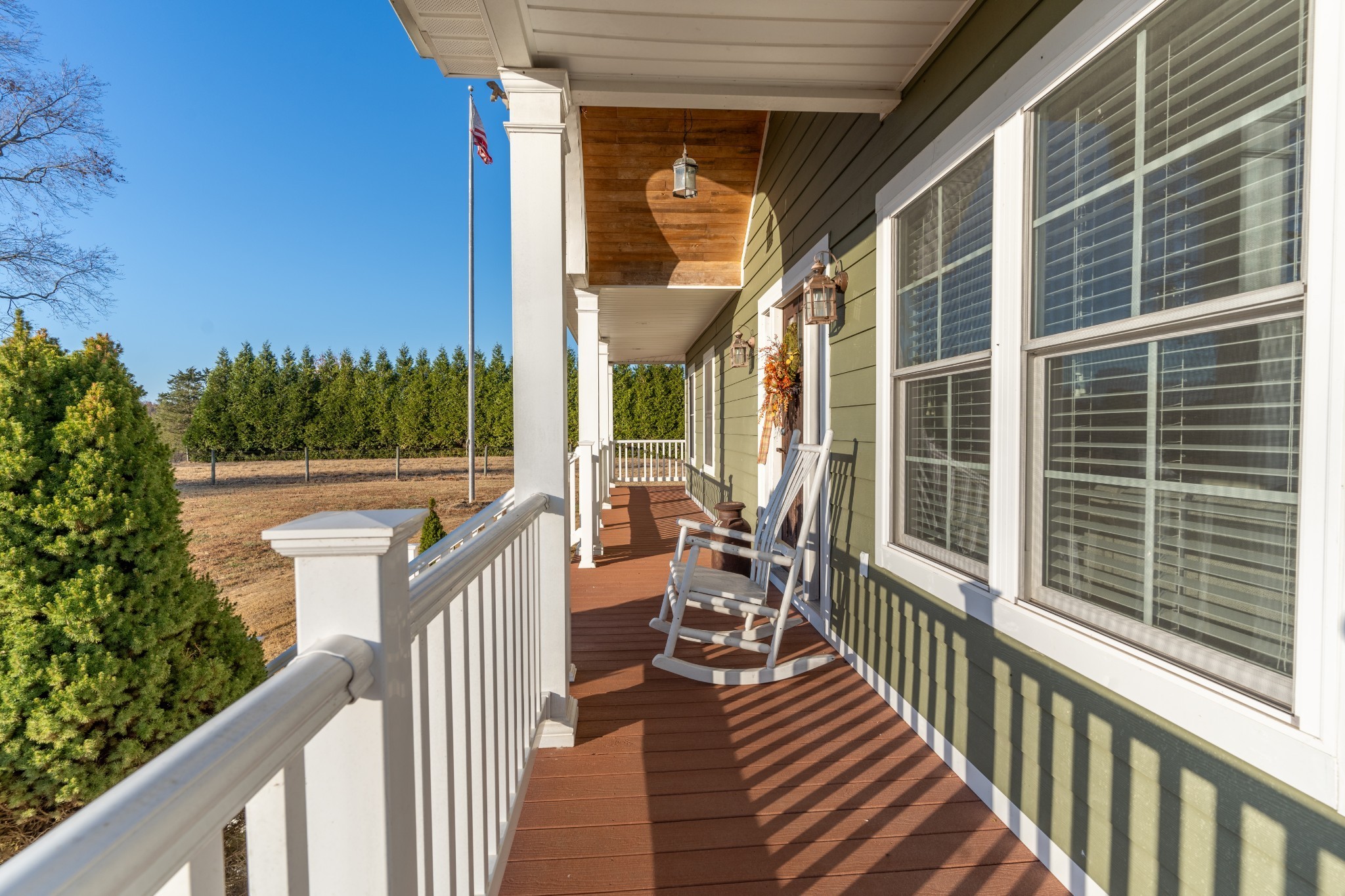 a view of a balcony with chairs