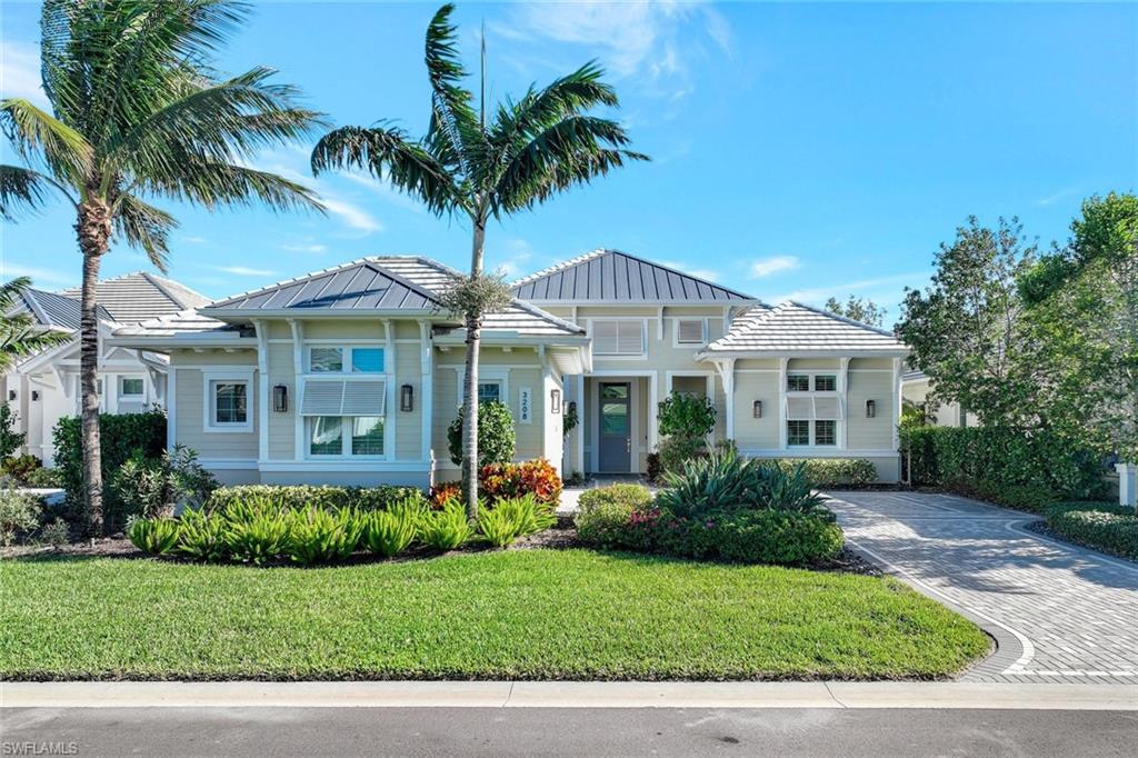 View of front of house with a front yard