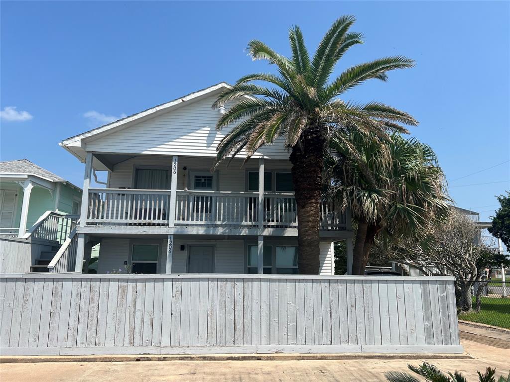 a view of a house with a roof deck