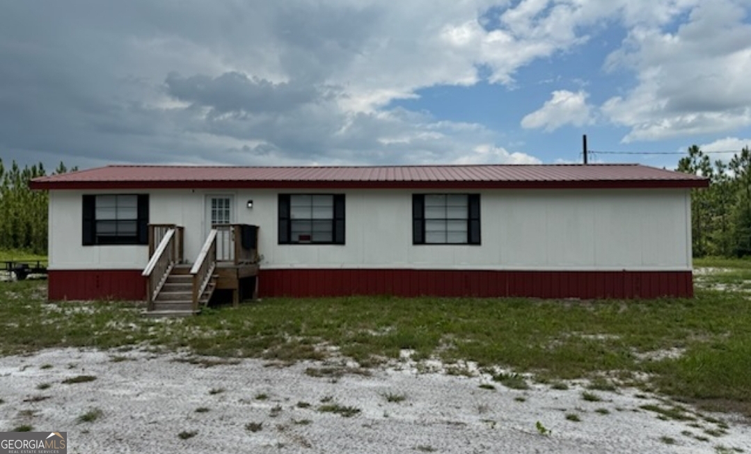 a front view of house with yard