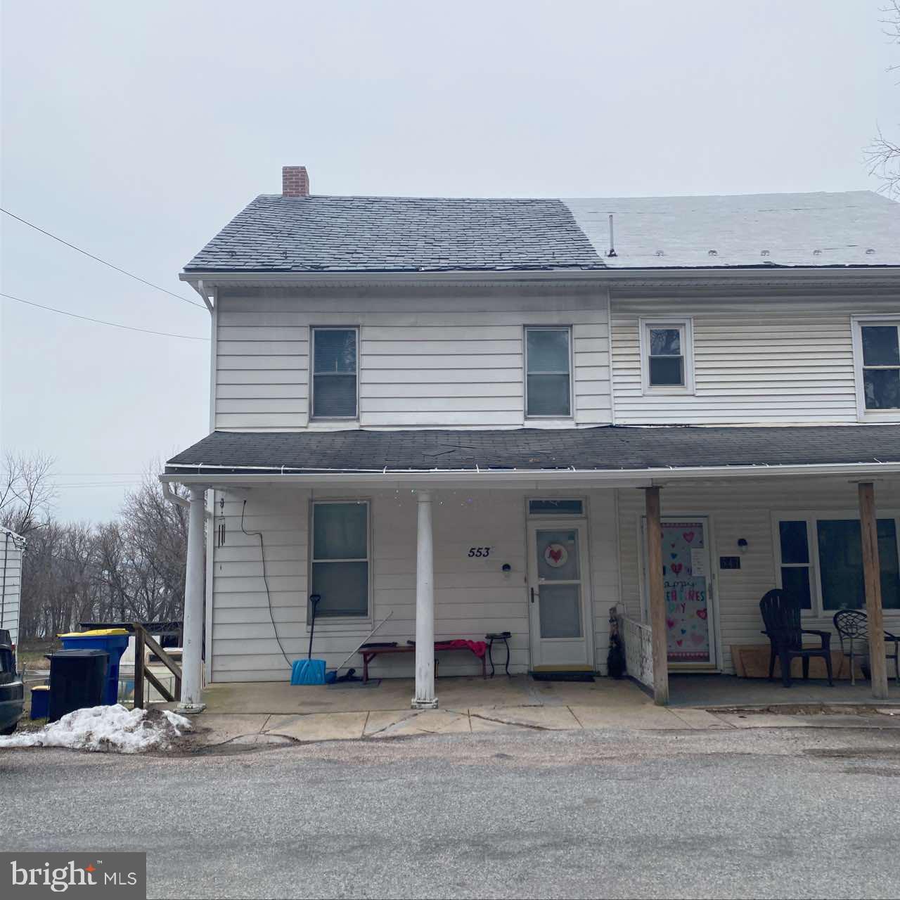 a front view of a house with a garage