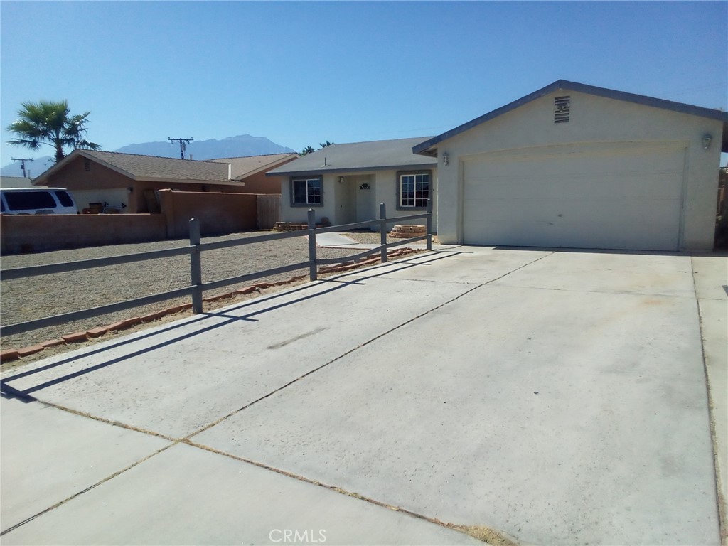 a house view with a backyard space