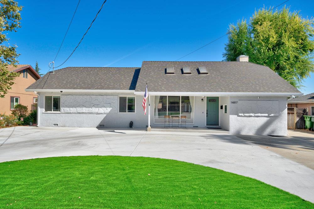 front view of a house with a yard