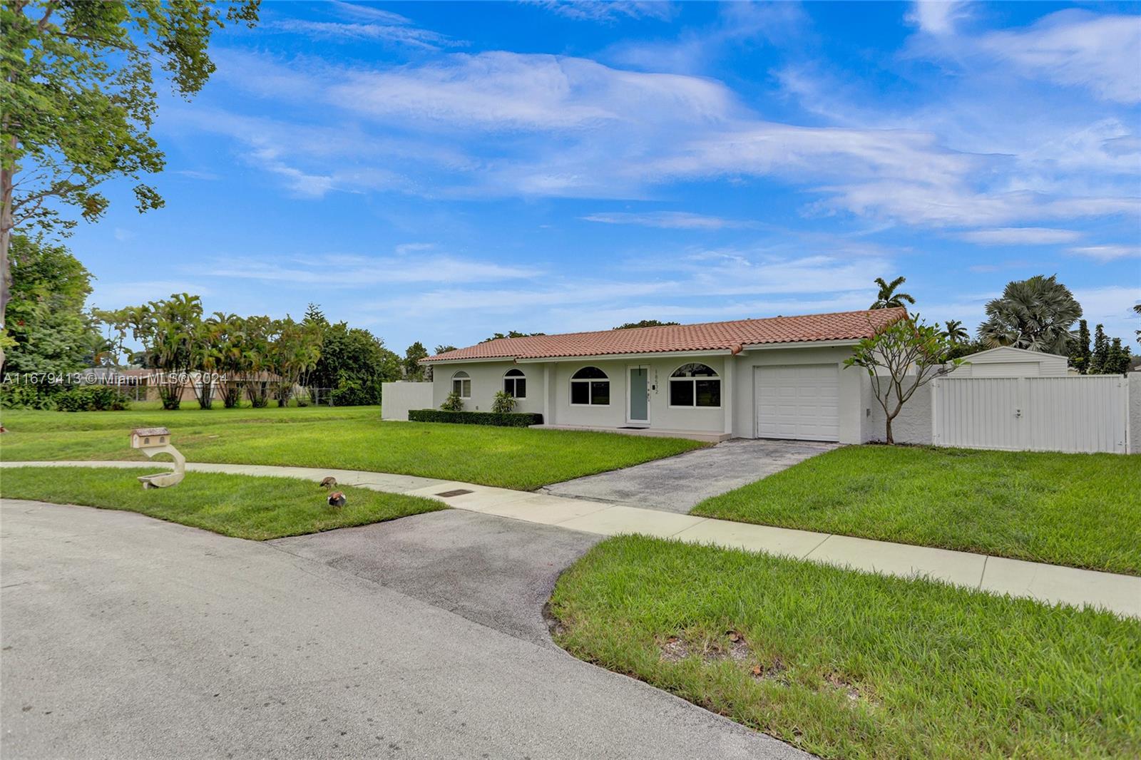 a view of a house with a big yard