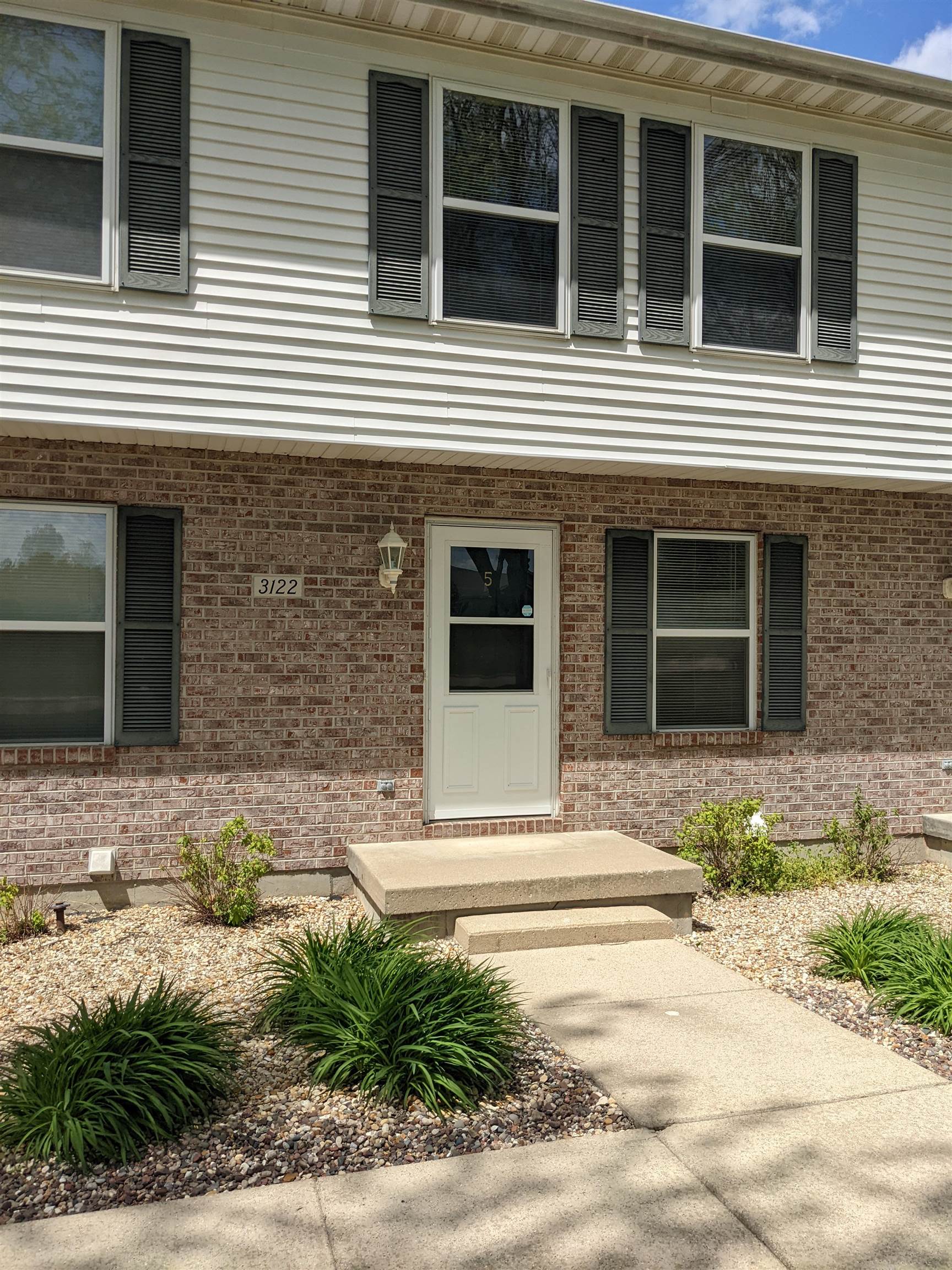 a house that has a window in front of it