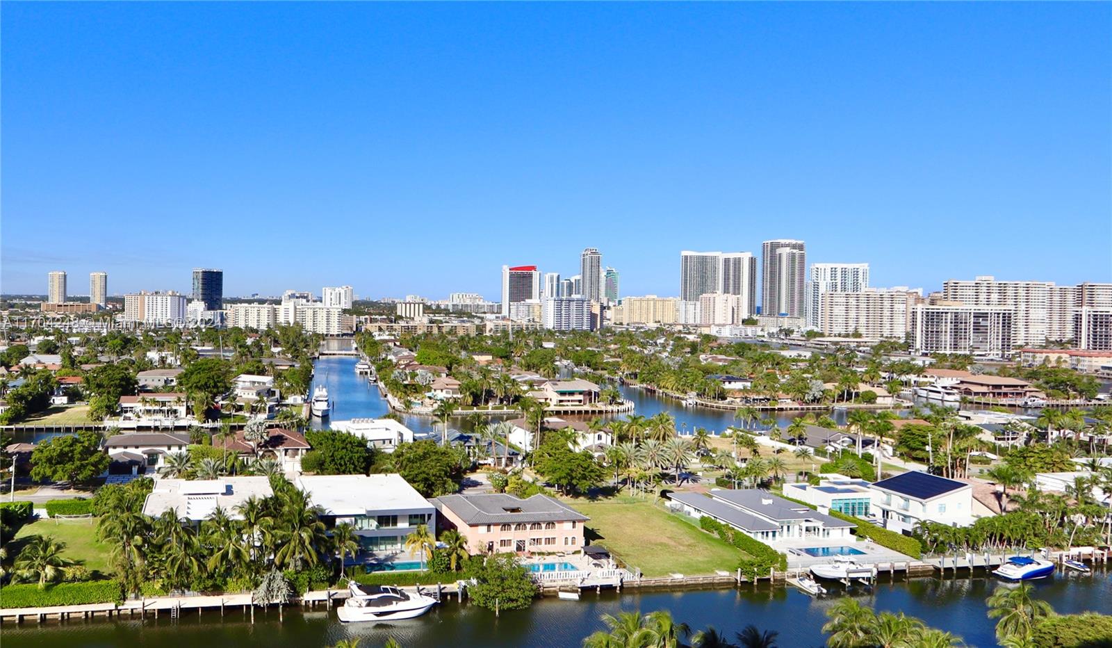 a view of a city with tall buildings