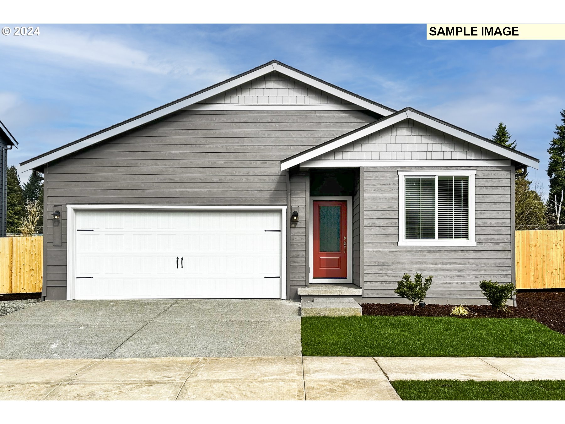 a front view of a house with garage