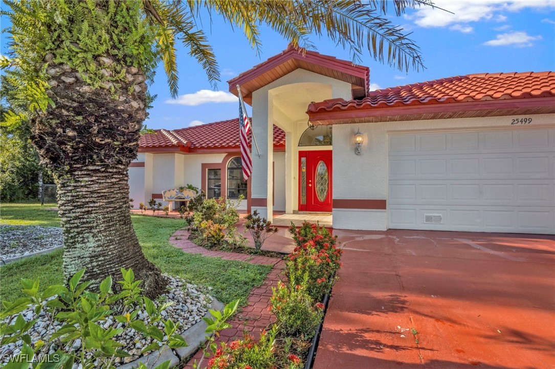 a front view of a house with yard