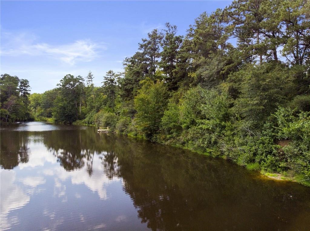 a view of lake with green space