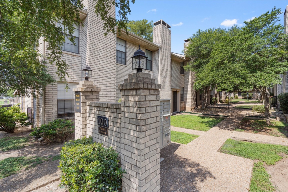 Beautiful courtyard leading to the front door.