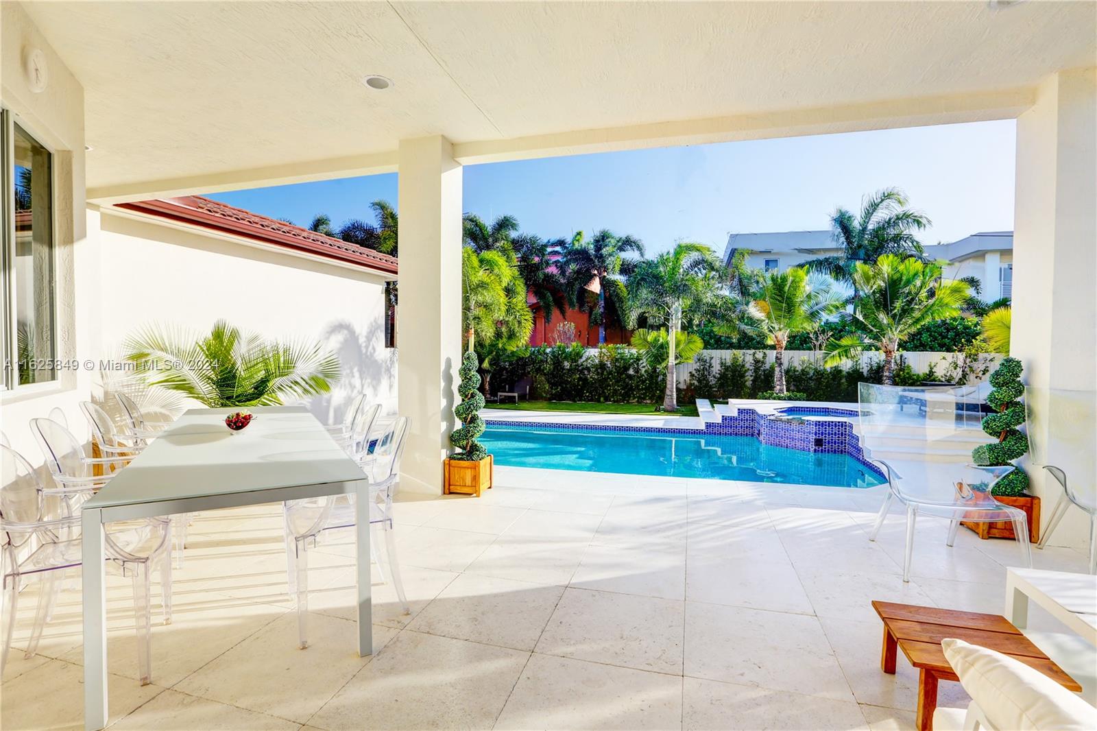 a view of yard with an outdoor seating