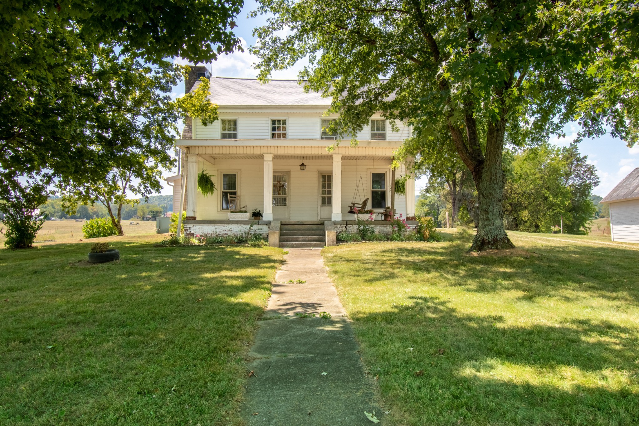 a view of a house with a swimming pool