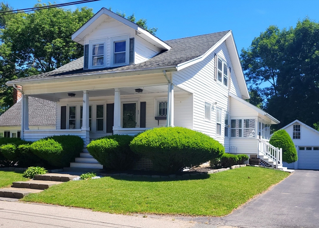 front view of a house and a yard