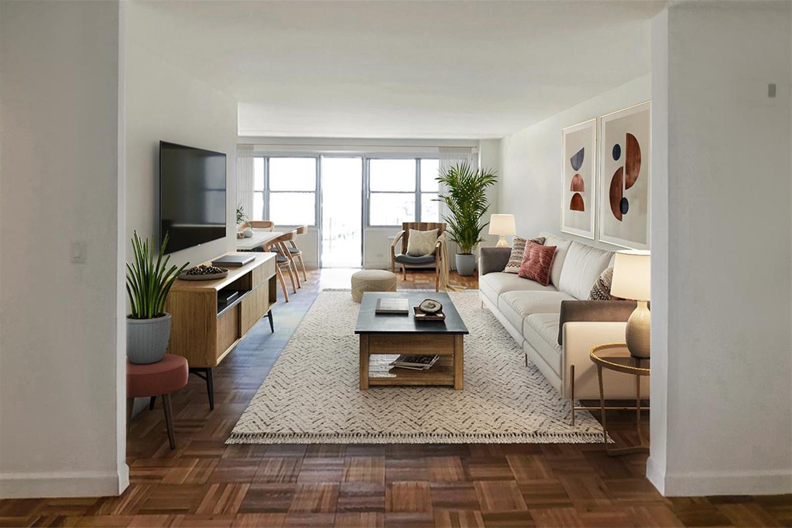 a living room with furniture and a flat screen tv