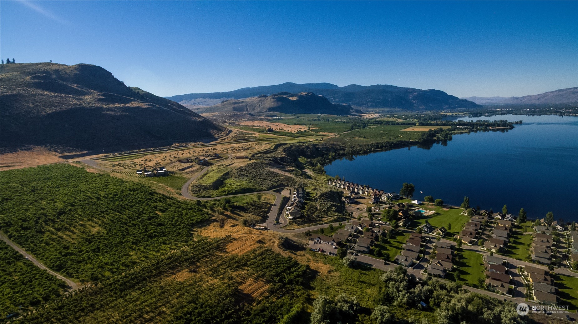 a view of a lake in middle of the town