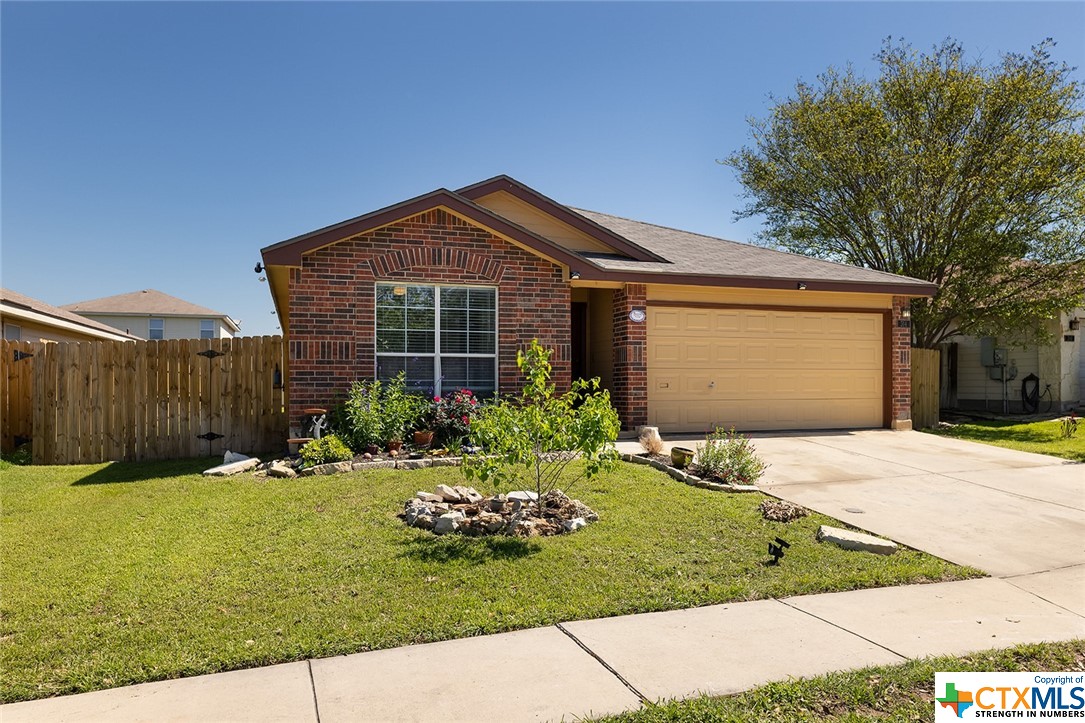 a front view of house with yard