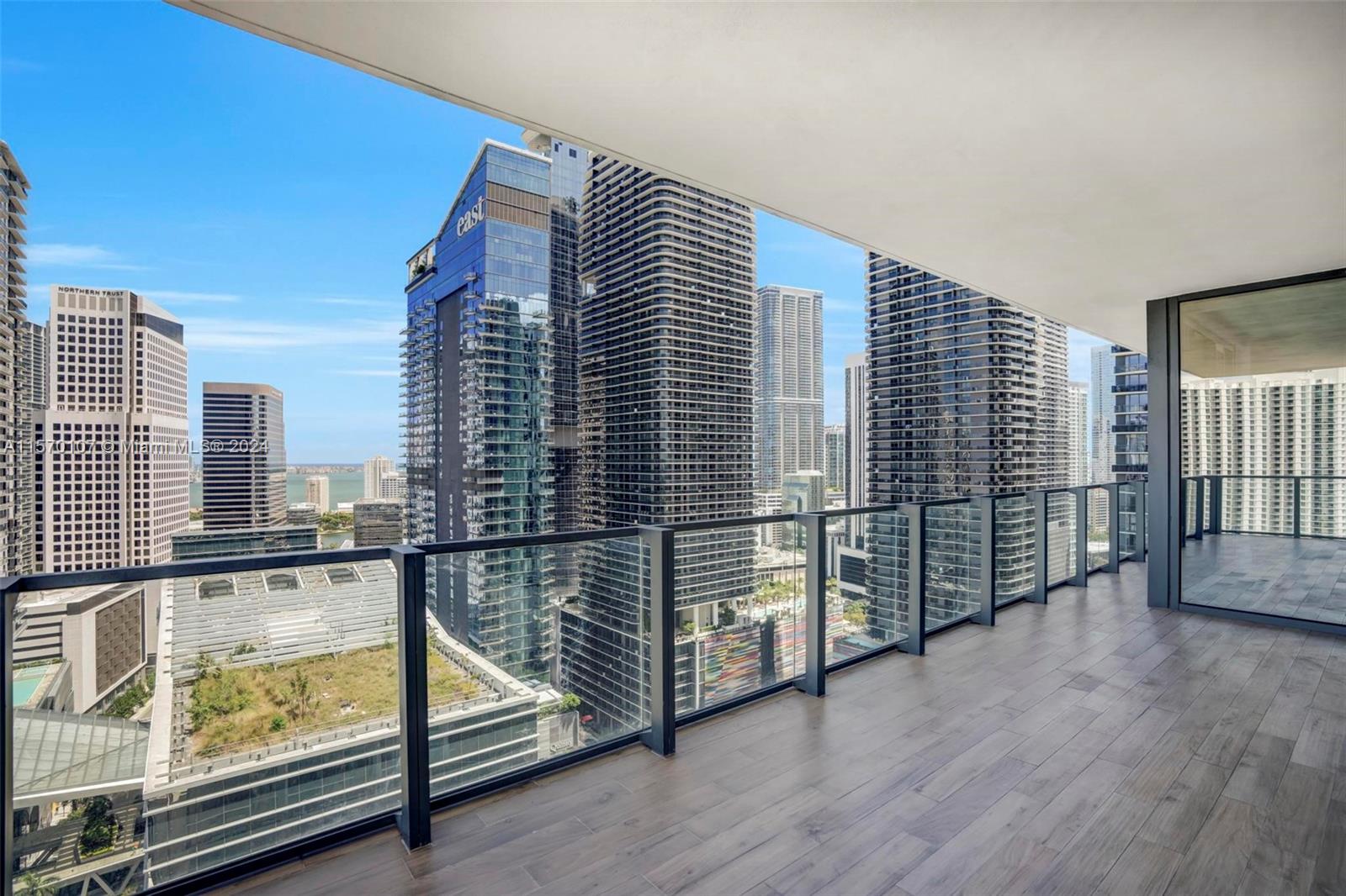 a view of a balcony with city view