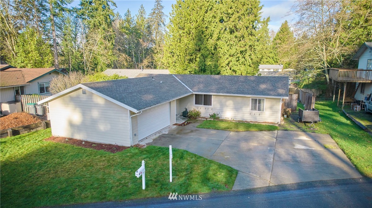 front view of house with a yard