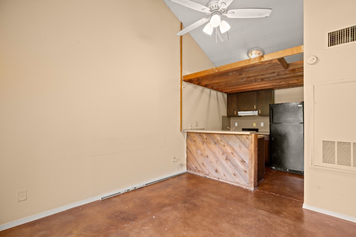 a view of kitchen and utility room