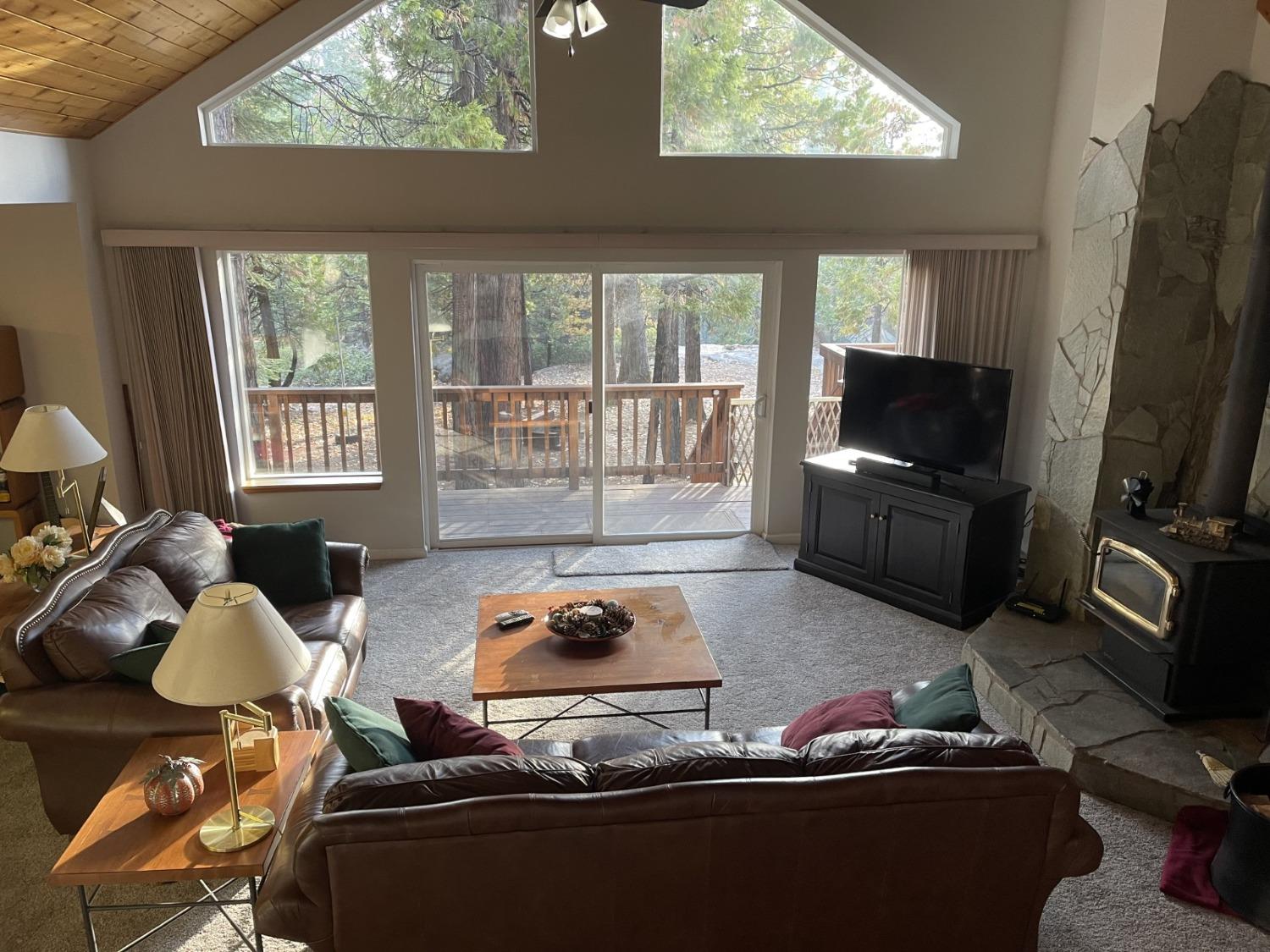 a room with furniture and a flat screen tv