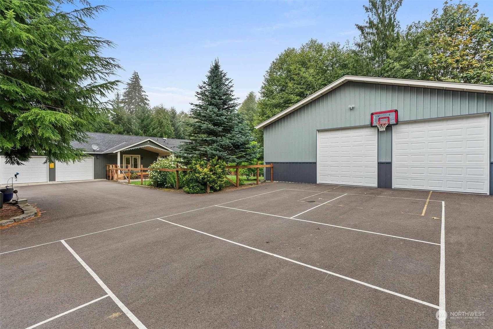 a view of garage and yard