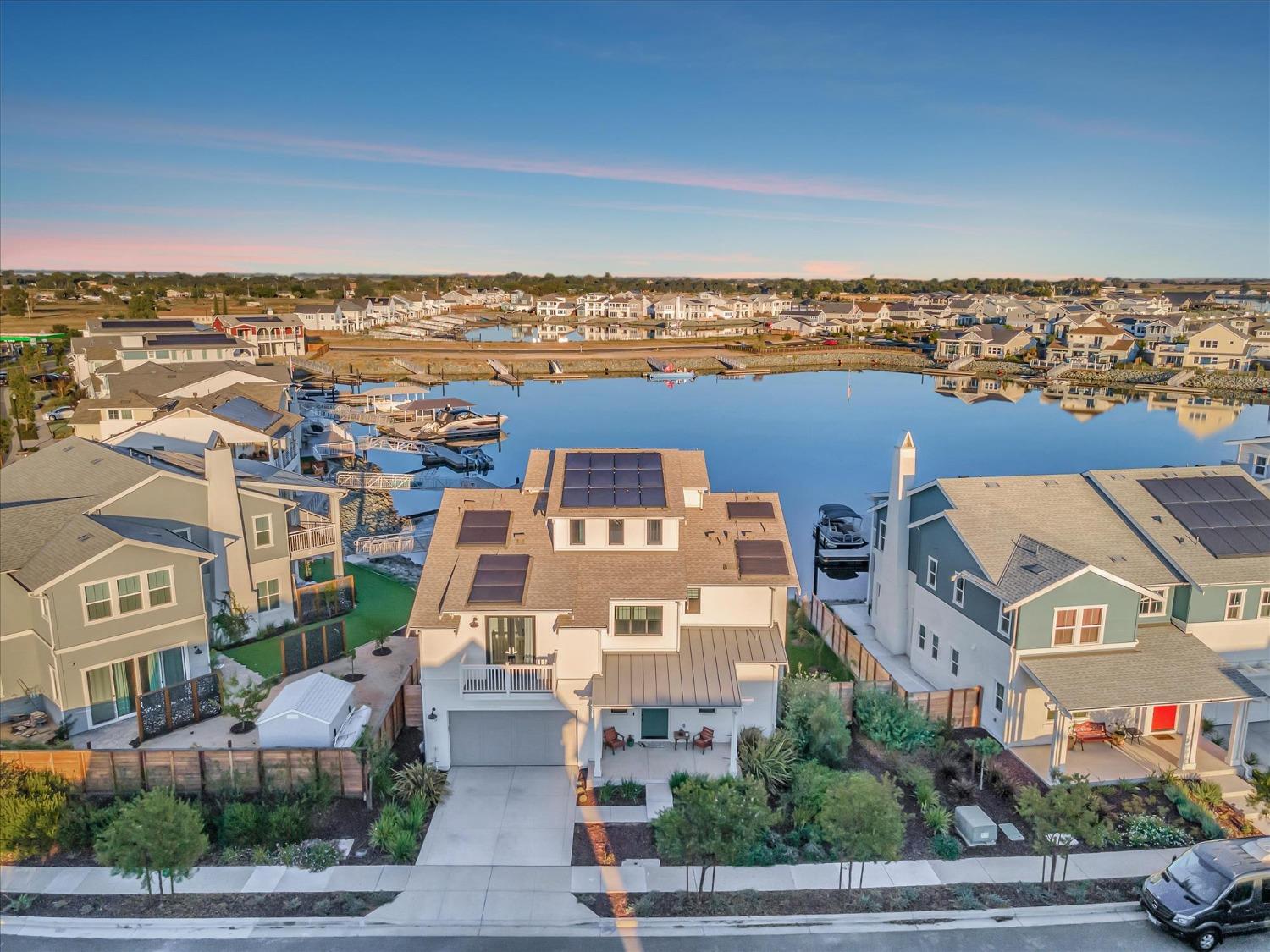 an aerial view of a building with a ocean view