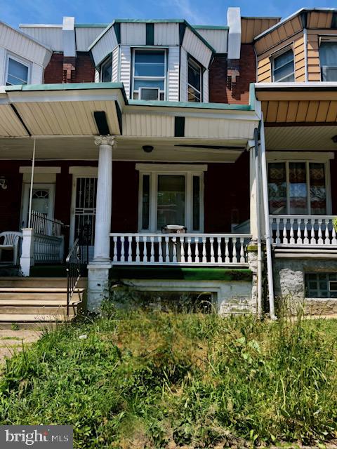 a view of a house with roof deck