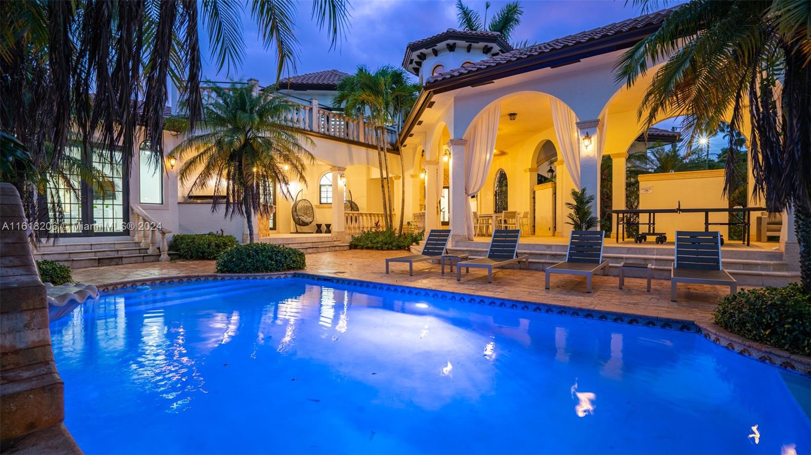 a swimming pool with outdoor seating yard and patio