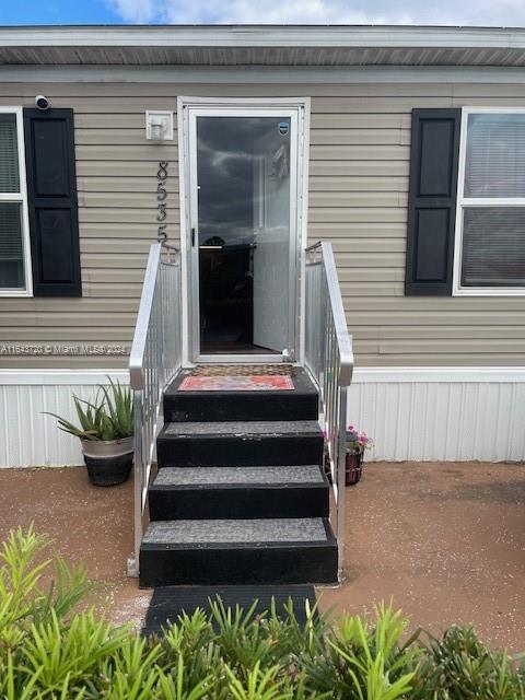 a view of entryway with a front door