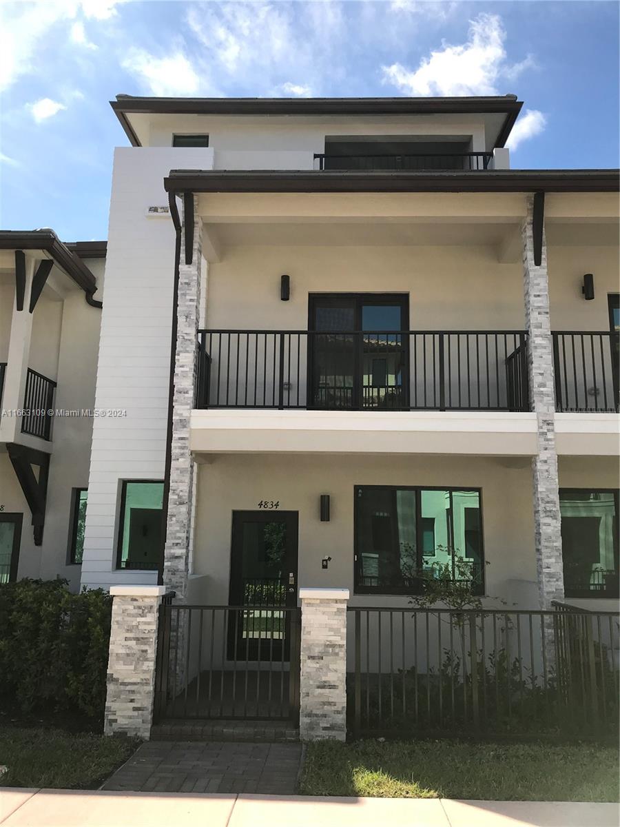 a view of a house with a balcony