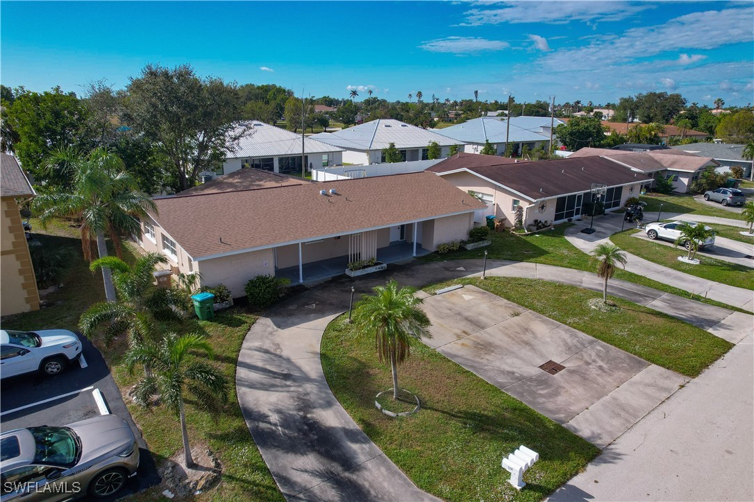 an aerial view of a house with a garden