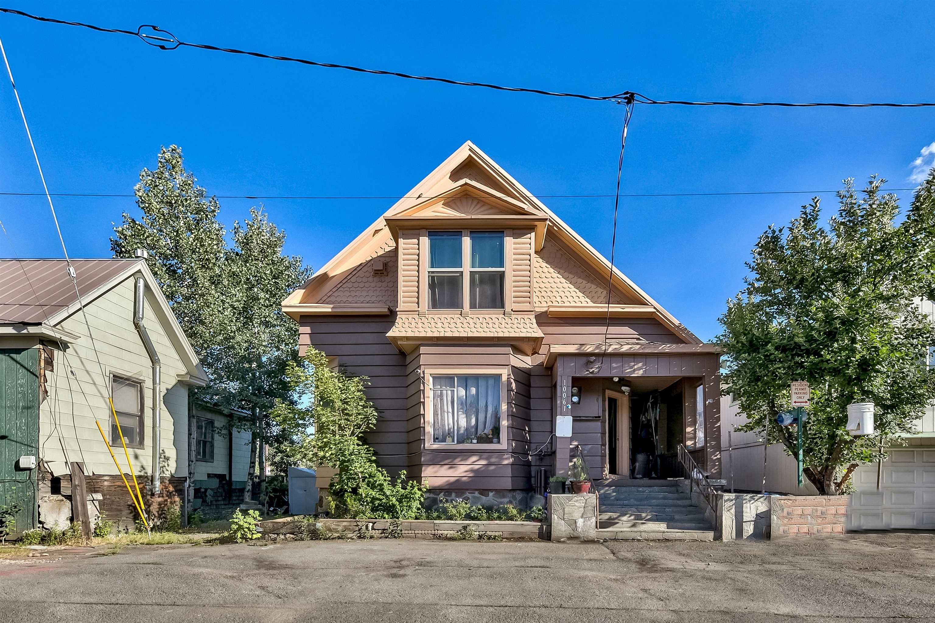 a front view of a house with yard