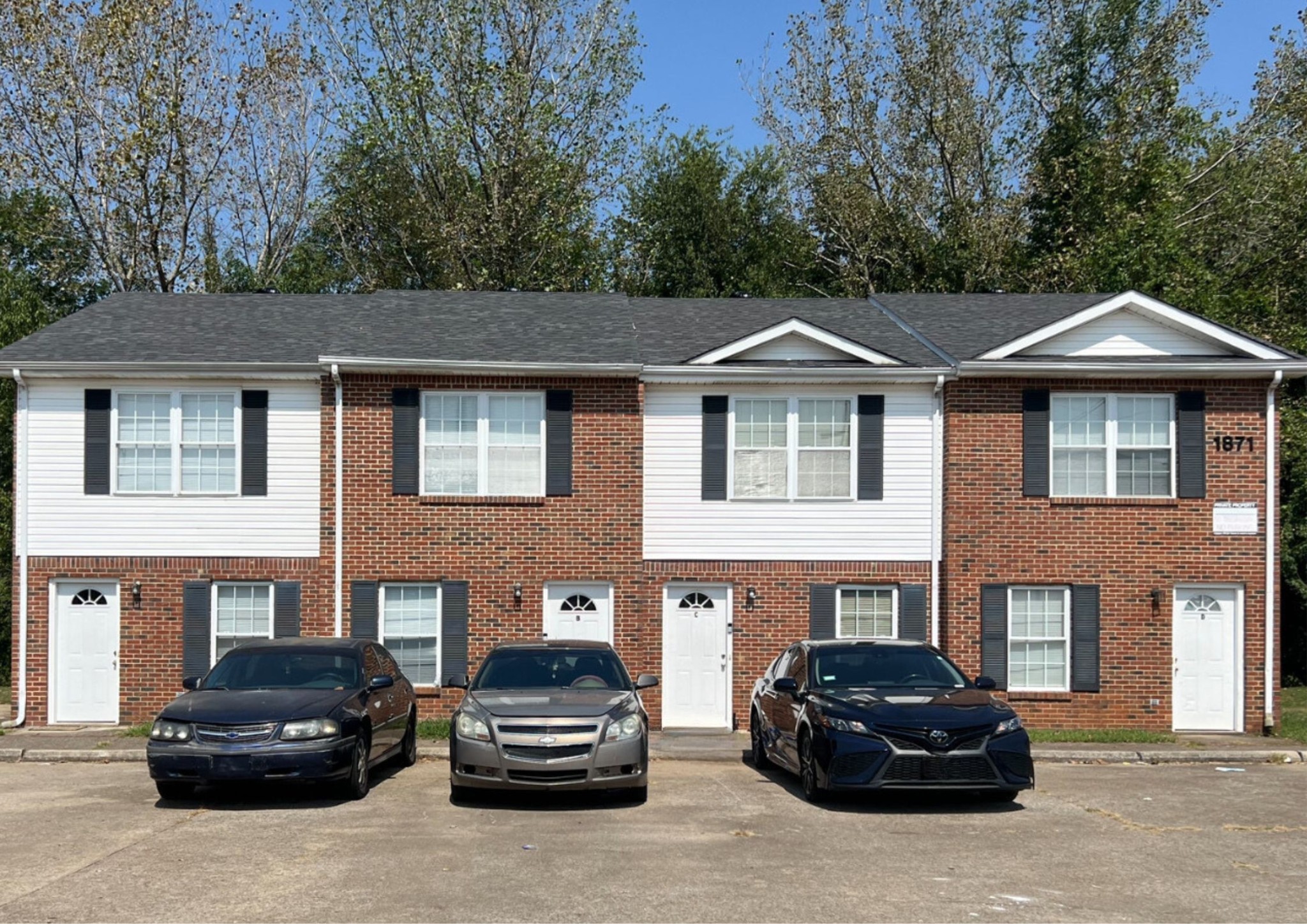 a car parked in front of a house