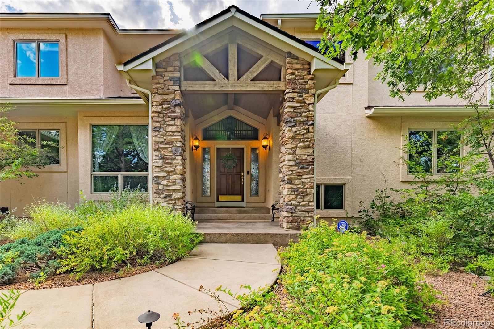 front view of a house with a small yard