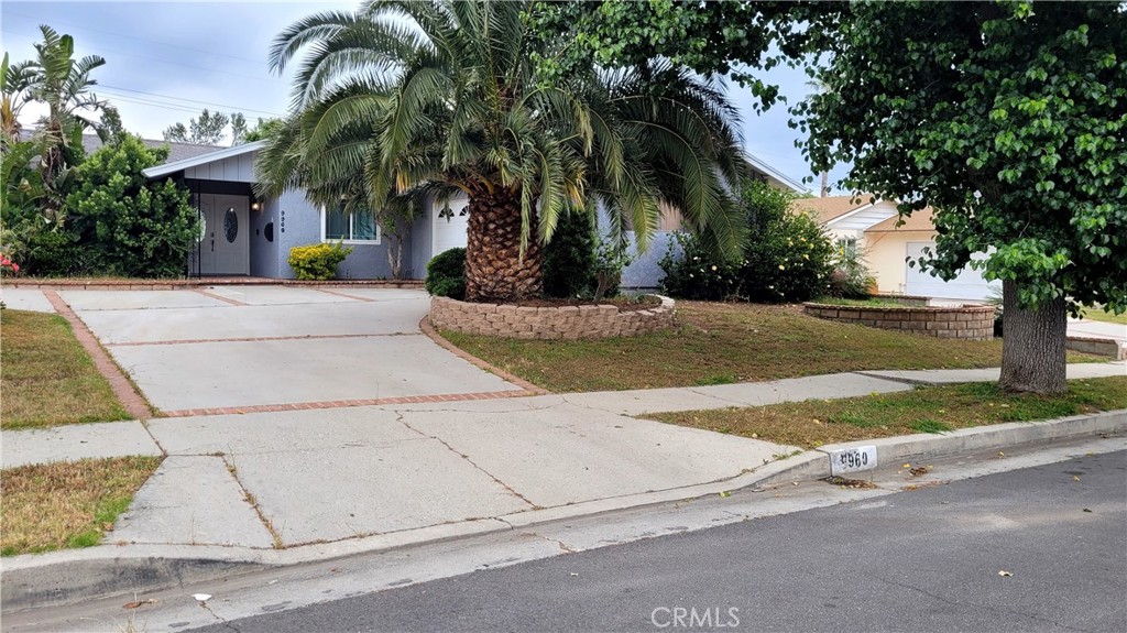 front view of a house with a street