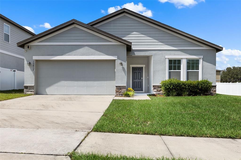 a front view of house with yard