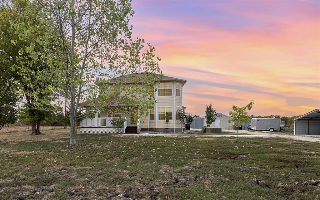 a front view of house with yard