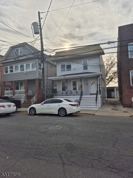 a view of street with parked cars